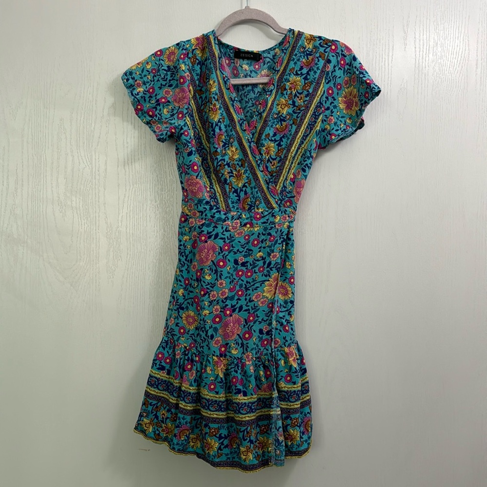 Medium, floral wrap-around dress.